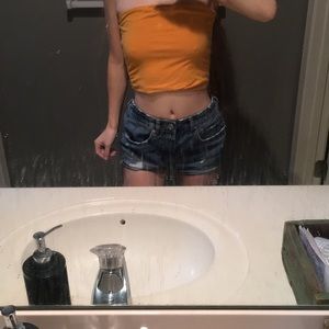 M Tilly’s white fawn tube top